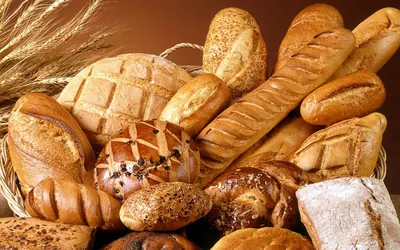 A basket of crusty loaves and rolls