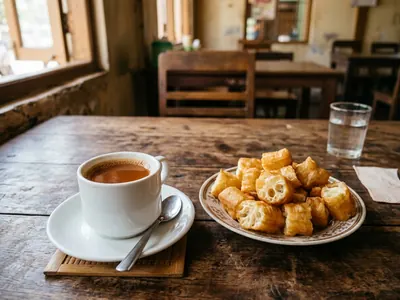 A cup of milk tea with fried dough sticks